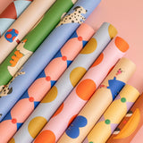 Kado Design - Geschenkpapier - Rolle • Hellblau/Curry gepunktet - ROSA ECK