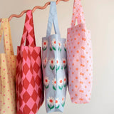 Kado Design - Tragetasche mit Blumenmuster | light fuchsia + blood orange + blonde - ROSA ECK Concept Store